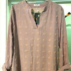100% polyester, Blooming Jelly brand, size XL Mauve v-neck blouse